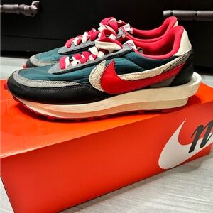 Nike LDWaffle x sacai x UNDERCOVER
Midnight Spruce and University Red US Mens 11